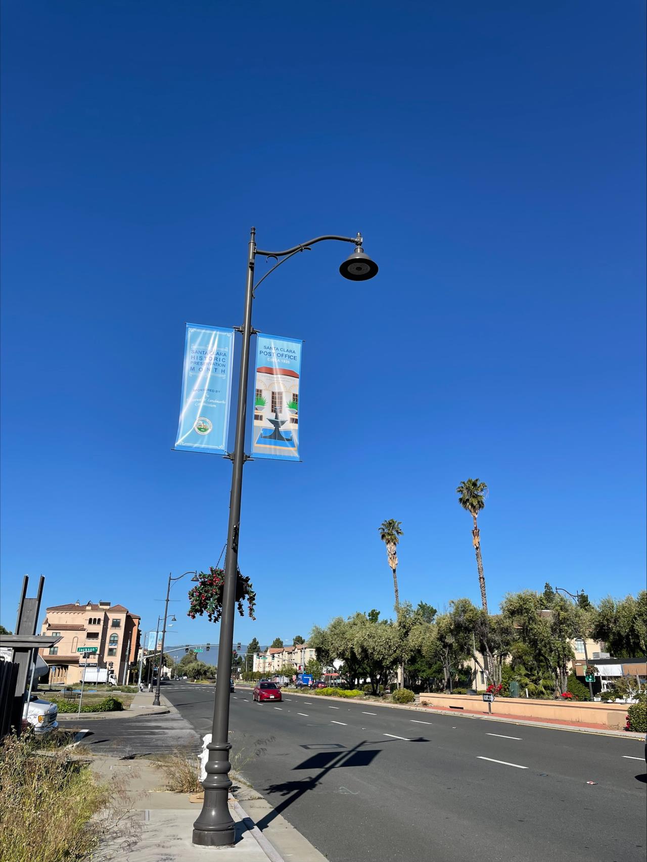 Post Office banner attached to light pole along El Camino Real