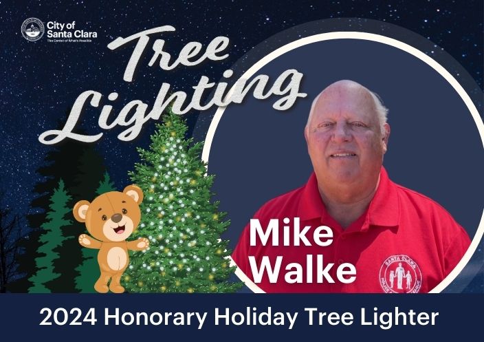 Teddy, the tree, and  Mike Wilke Text: Tree Lighting Mike Wilke 2024 Honorary Tree Lighter